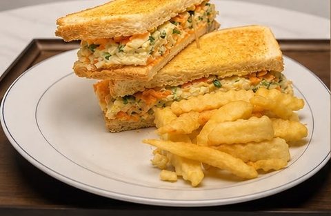 Egg and Vegetables sandwich with fries