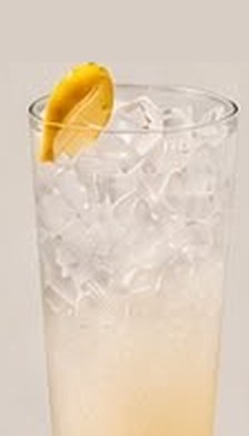 Lemonade with lemon wedge